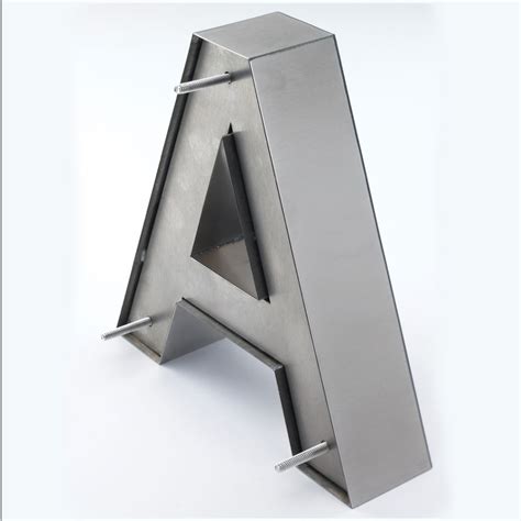 fabricated metal lettering on stone|manufactured metal sign letters.